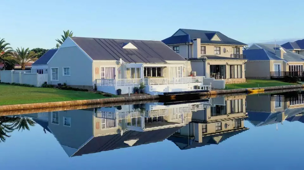 【疫情重創經濟，但沒打房】全球房價不降反升，新冠疫情如何助長房市？