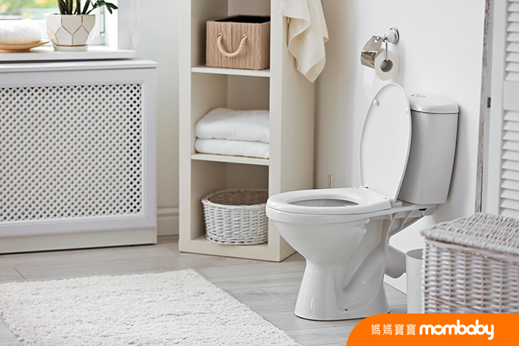 Toilet bowl in modern bathroom interior