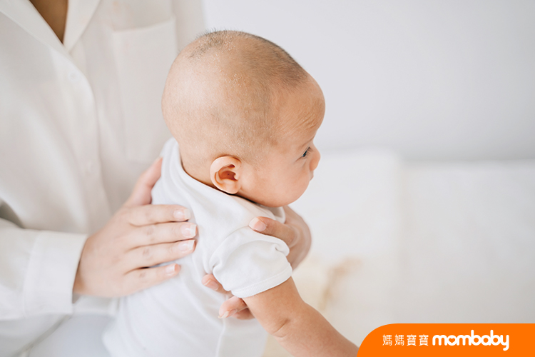 From,Above,Of,Mom,Patting,Adorable,Newborn,Son,Massaging,Back