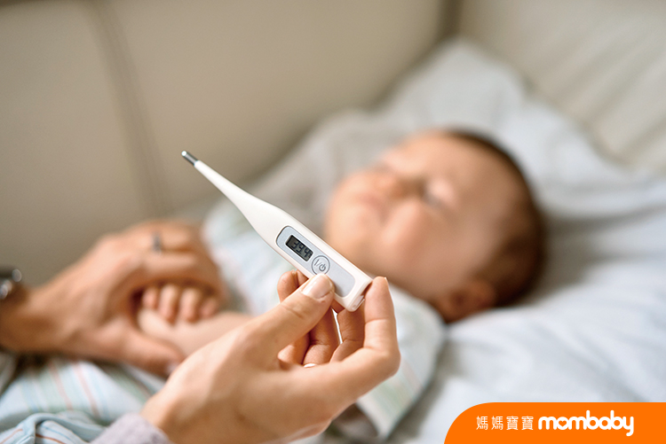 Worried,Young,Mother,Sitting,On,Sofa,Beside,Her,Sick,Son